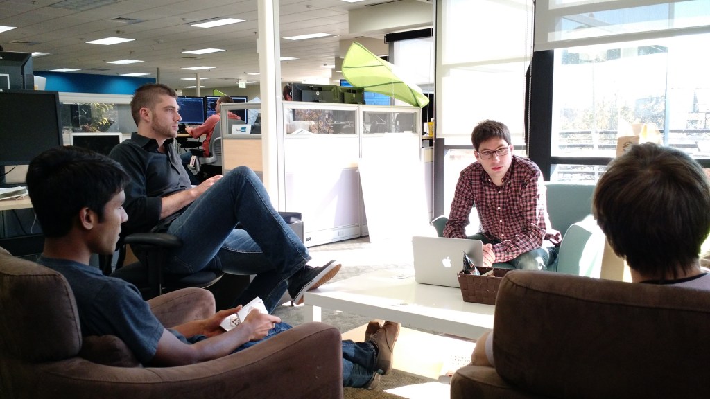 Senior data scientist Mathieu Bastian, second from right, meets with his team of data scientists at company headquarters.