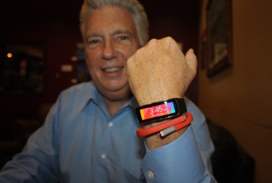 Jim Barry of the CEA shows off his fitness bands.