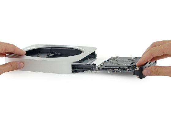 Sliding out the internals of the 2014 Mac Mini.