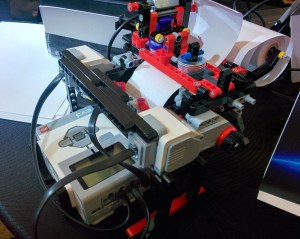 Braigo's Braille printer prototype includes Lego Mindstorms components as well as an Intel Edison chip.