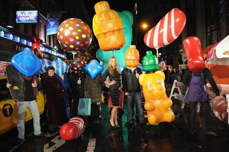 Model and actress Molly Sims helps promote Candy Crush Soda Saga.