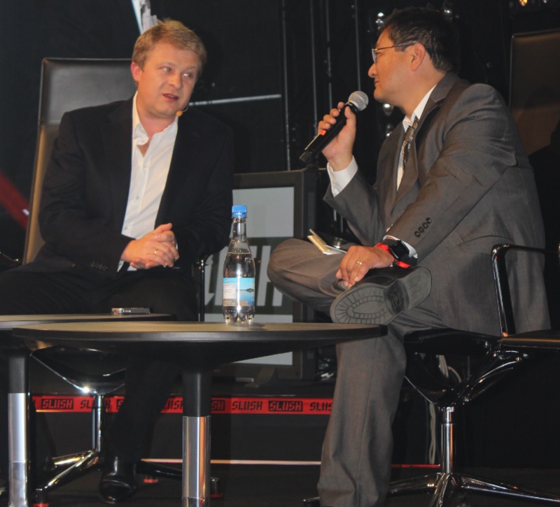 Victor Kislyi (left), CEO of Wargaming.net, on stage with Dean Takahashi at Slush 2014.