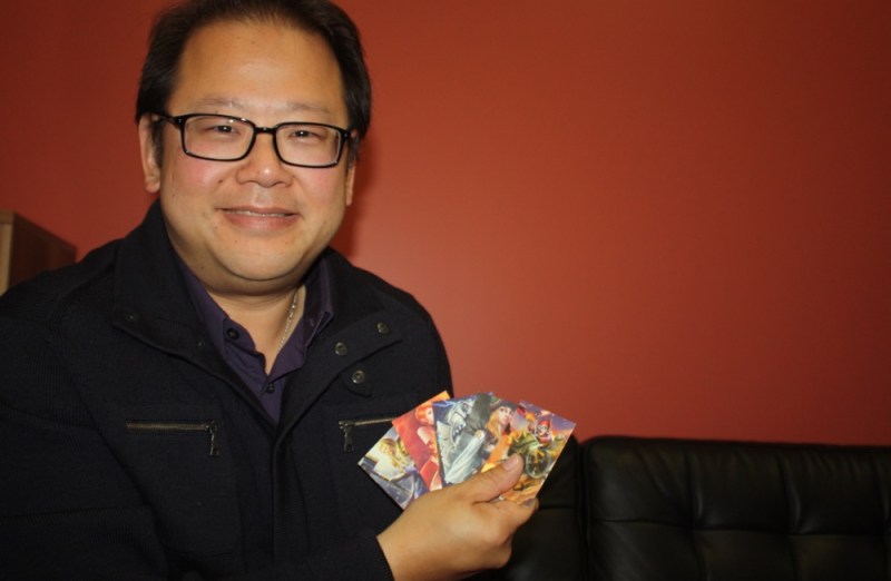 Jim Ngui shows off Heroes Charge cards