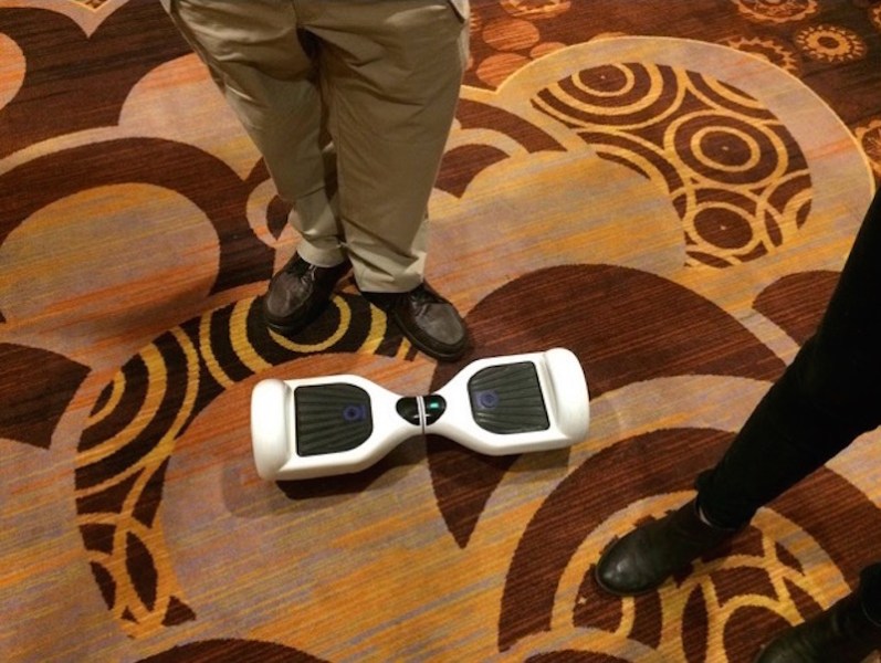 Checking out IO Hawk's Smart Wheels gadget at CES 2015.