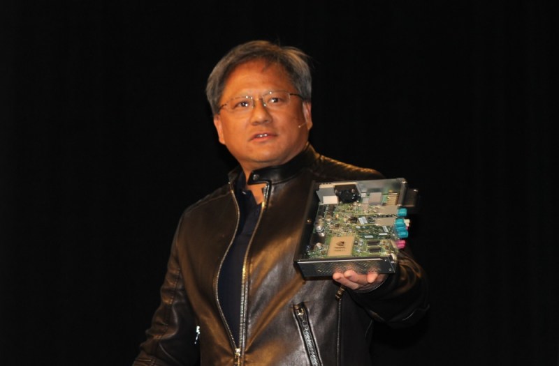Nvidia CEO Jen-Hsun Huang shows off the Nvidia Drive CX.