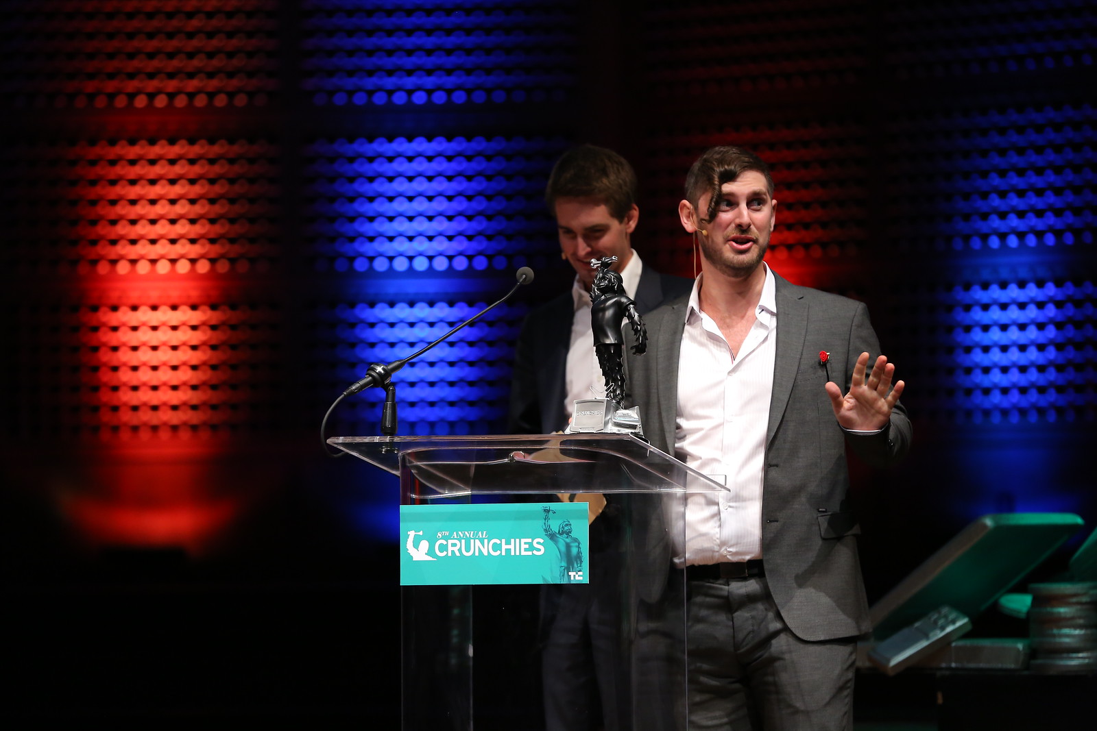 TechCrunch's Josh Constantine and SnapChat CEO Evan Spiegel present an award at the Crunchies.