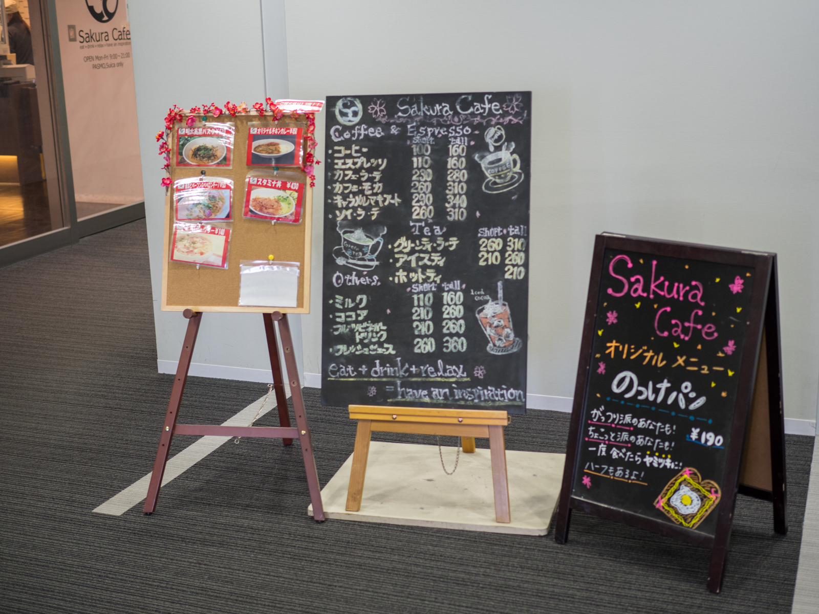 The entry and signboards for Sakura Cafe, DeNA's cafeteria. It was named after a founder's dog.