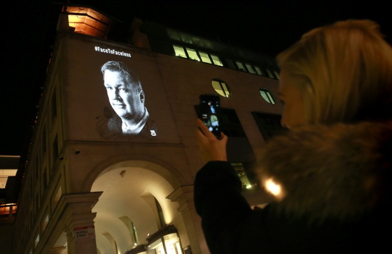 Warren Wolfe, a London cabbie, is projected onto the Royal Opera House