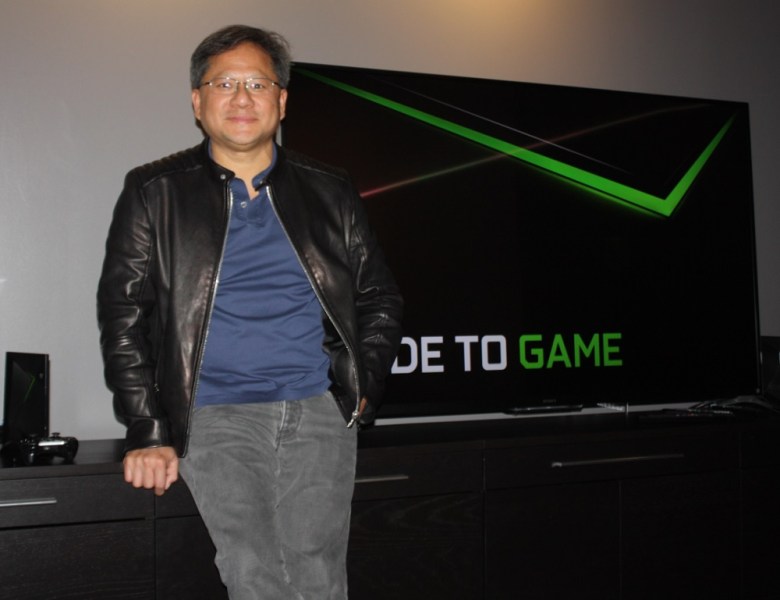 Nvidia CEO Jen-Hsun Huang with the Shield Set-Top Console