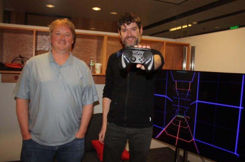 Eric Johnson and Scott Dalton (right) at Valve with a Steam Machine controller.