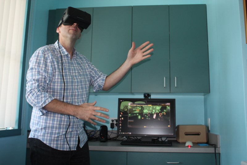 Brett Durrett, chief executive of IMVU, using the Oculus Rift headset.