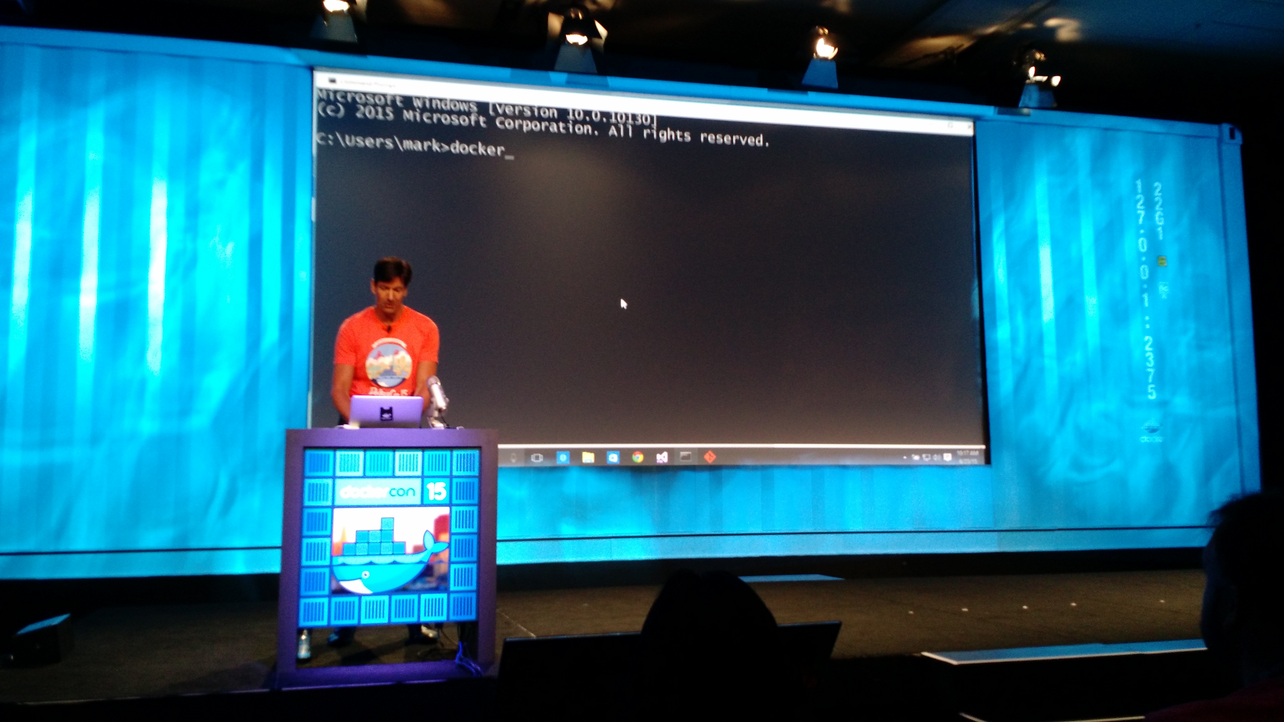 Mark Russinovich uses Docker to build an application that includes some code running in a container on Windows Server and other code running in a container on a Linux server at the DockerCon conference in San Francisco on June 23.