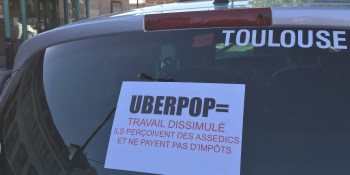 Two Uber execs in France held by police as tensions mount
