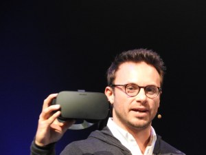 Brendan Iribe with the final consumer version of the Oculus Rift virtual-reality headset.