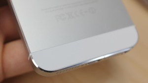 That shiny polished metal angled edge around the edge of the phone is a "chamfered edge."