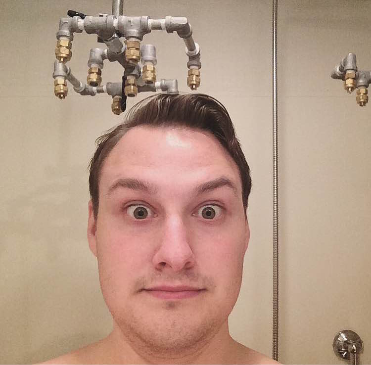 "I will regret posting this." Harrison Weber tests a prototype of Nebia's shower system.