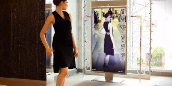 Memomi’s MemoryMirror lets you try on clothes without actually putting them on