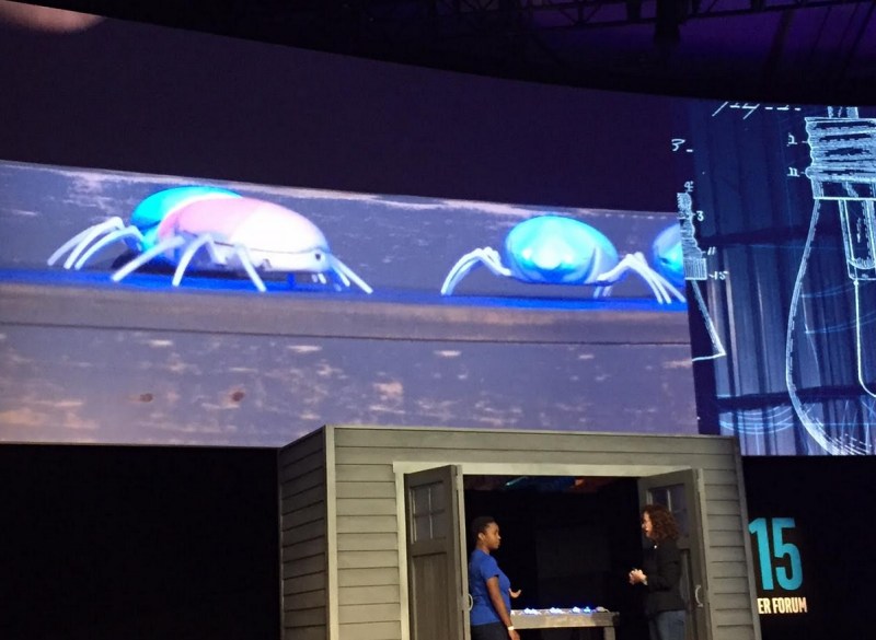 Sade shows off an electronic scarab beetle to Intel's Genevieve Bell.