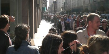 Line-waiting Apple fanatics rush to grab new iPhones in annual rite of commercial self-flagellation