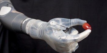 This mind-controlled robotic arm can relay the sensation of touch