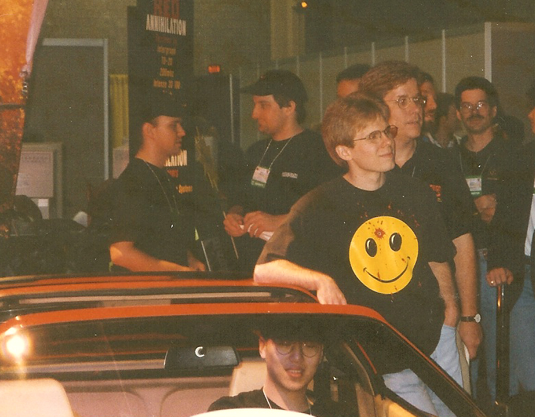 Dennis "Thresh" Fong in the Ferrari 328GTS convertible he won in the Red Annihilation Quake Tournament at the 1997 Electronic Entertainment Expo (E3). 