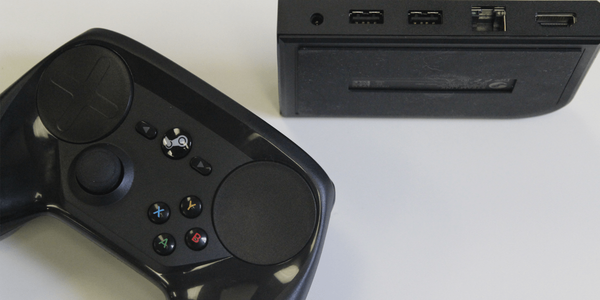 Steam Controller laying down with Steam Link standing up