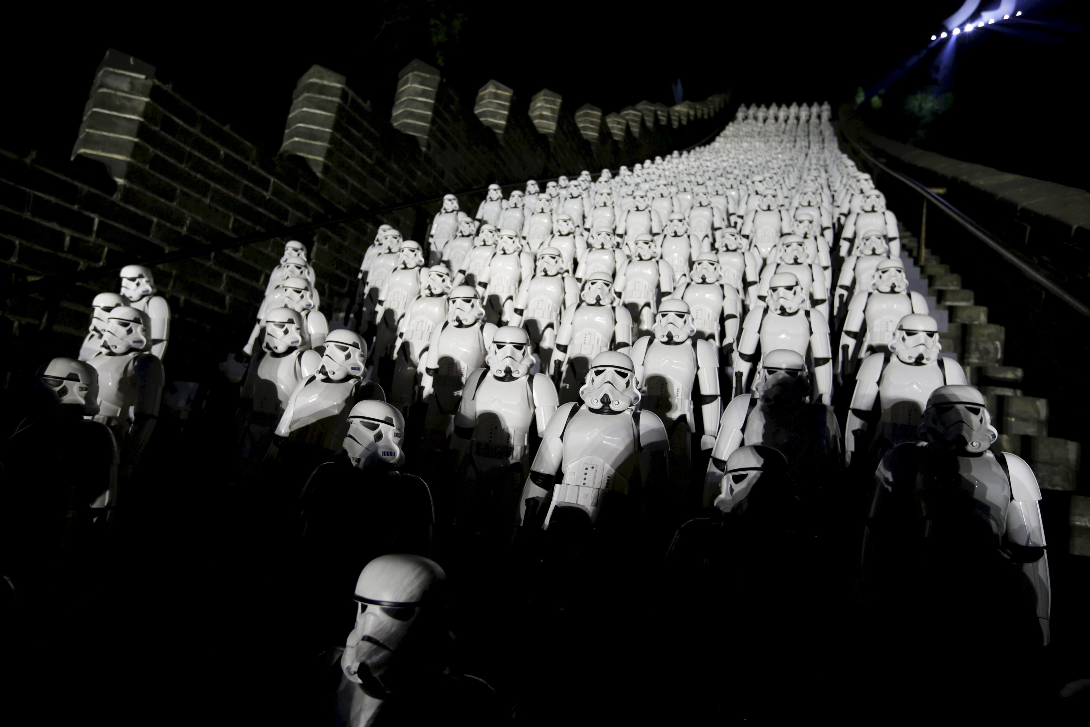 Five hundred replicas of the Stormtroopers characters from "Star Wars" are seen on the steps at the Juyongguan section of the Great Wall of China during a promotional event for "Star Wars: The Force Awakens" film, on the outskirts of Beijing, China, in this October 20, 2015 file photo. REUTERS/Jason Lee/Files