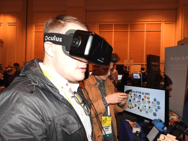 Harrison Weber of VentureBeat tries out an Oculus Rift.