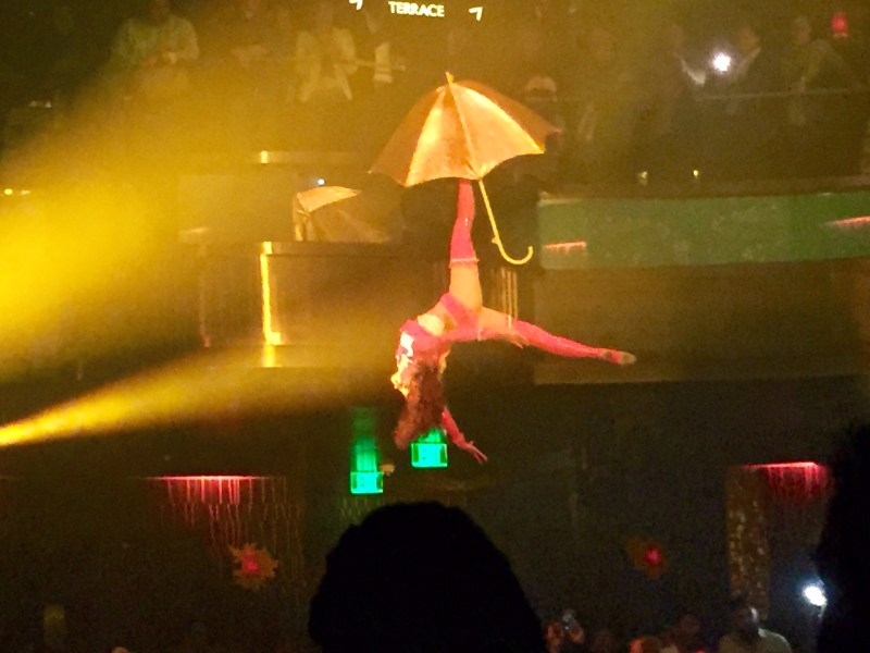 A woman hangs from the ceiling at the Omnia nightclub.