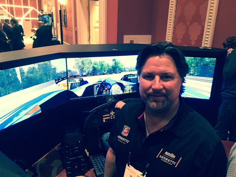 Michael Andretti of Amlin Andretti Formula E team, in front of a racing simulator at CES 2016.