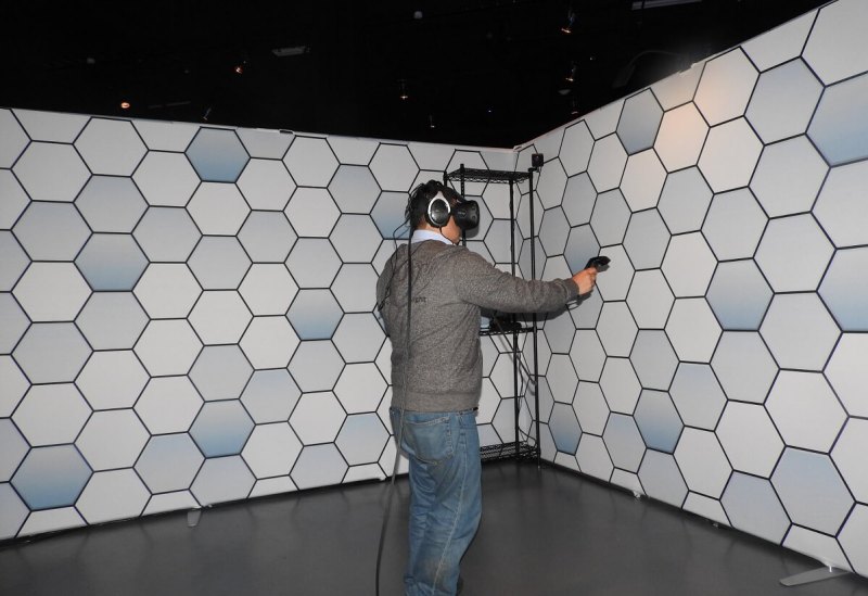 Dean Takahashi plays with the HTC Vive VR headset.