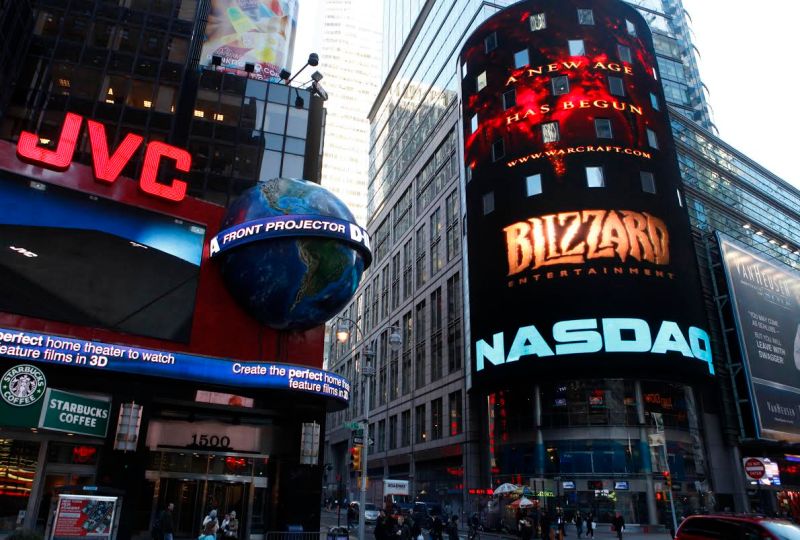 Trailers for Blizzard Entertainment's World of Warcraft: Cataclysm and StarCraft II play outside the NASDAQ Marketsite after Activision and Blizzard executives celebrated Blizzard's twentieth anniversary by ringing the closing bell, Monday, March 7, 2011 in New York. (Jason DeCrow/AP Images for Blizzard Entertainment)