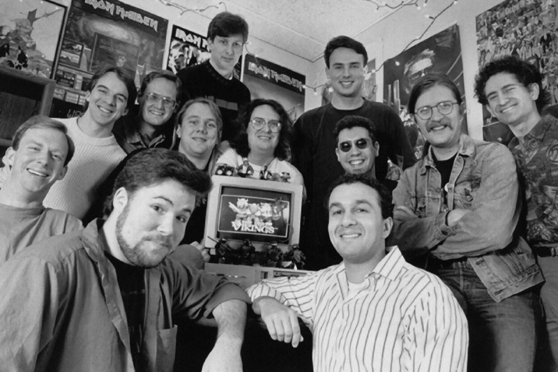 The early Blizzard team (then known as Silicon & Synapse), with Allen Adham in the striped shirt and Mike Morhaime on the far right.