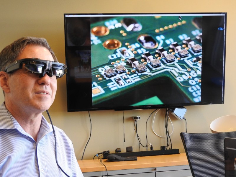 Jim Marggraff, CEO of Eyefluence, wearing AR glasses with Eyefluence prototype hardware attached.