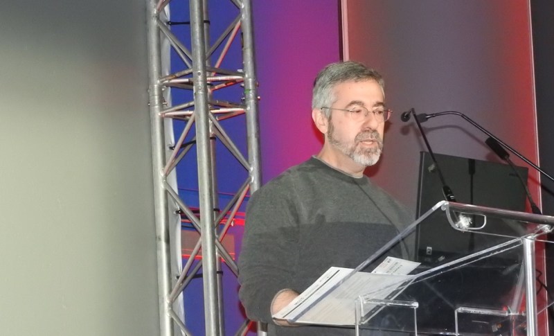 Warren Spector gives a talk at last fall's MIGS event in Montreal.