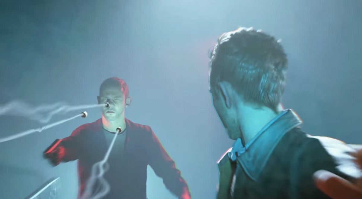 Will is about to get hit by bullets in slow-motion. But Jack can save him in this scene from Quantum Break.