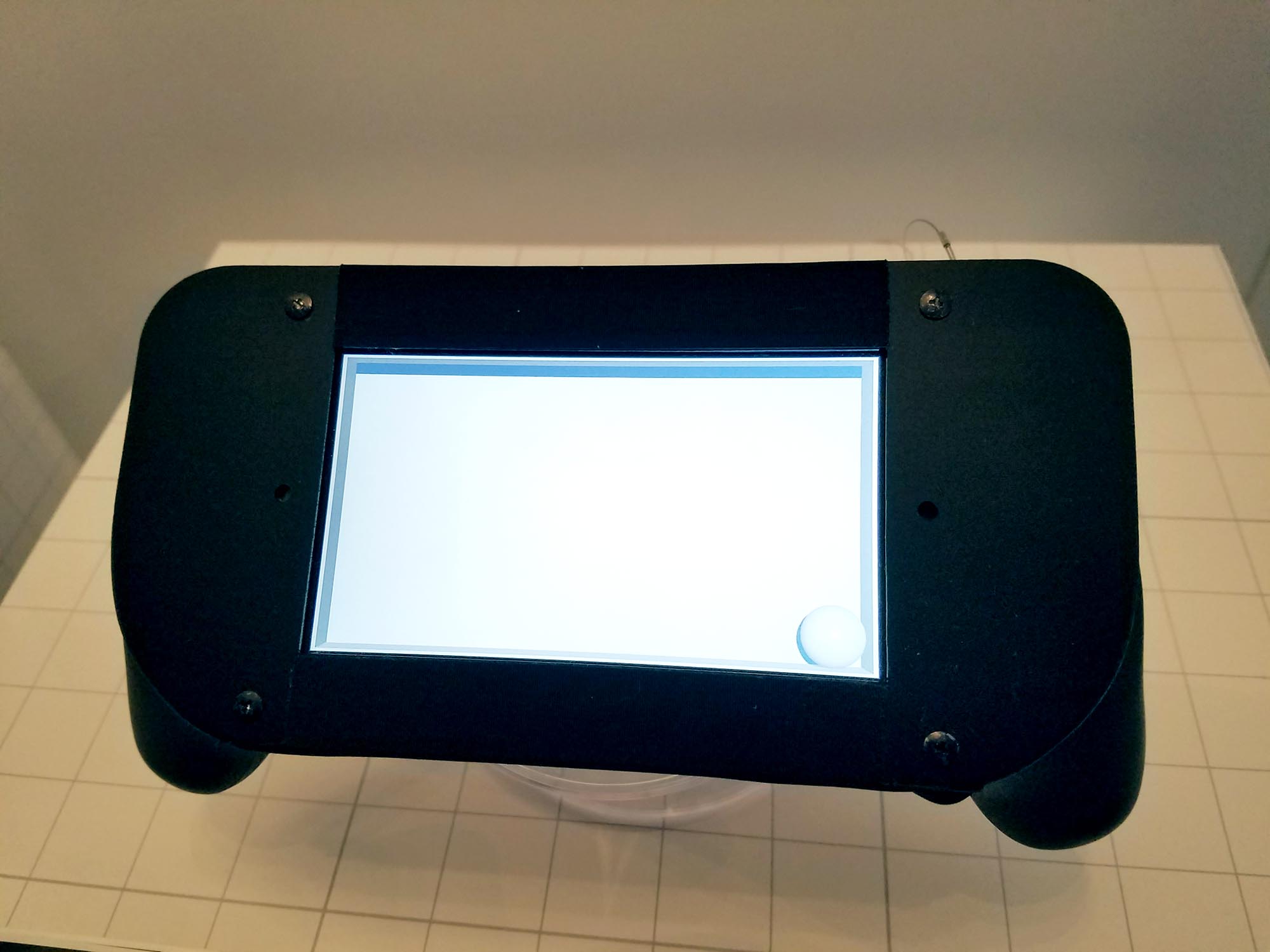 Sony demonstrates its haptic feedback technology on this handheld game console at South by Southwest Interactive on March 11, 2016.