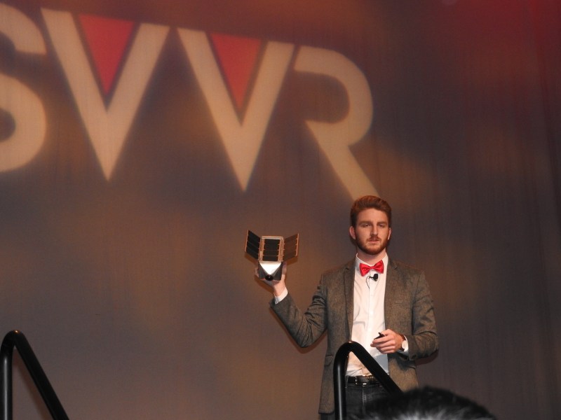 Ben Holmes holds SpaceVR satellite VR camera.