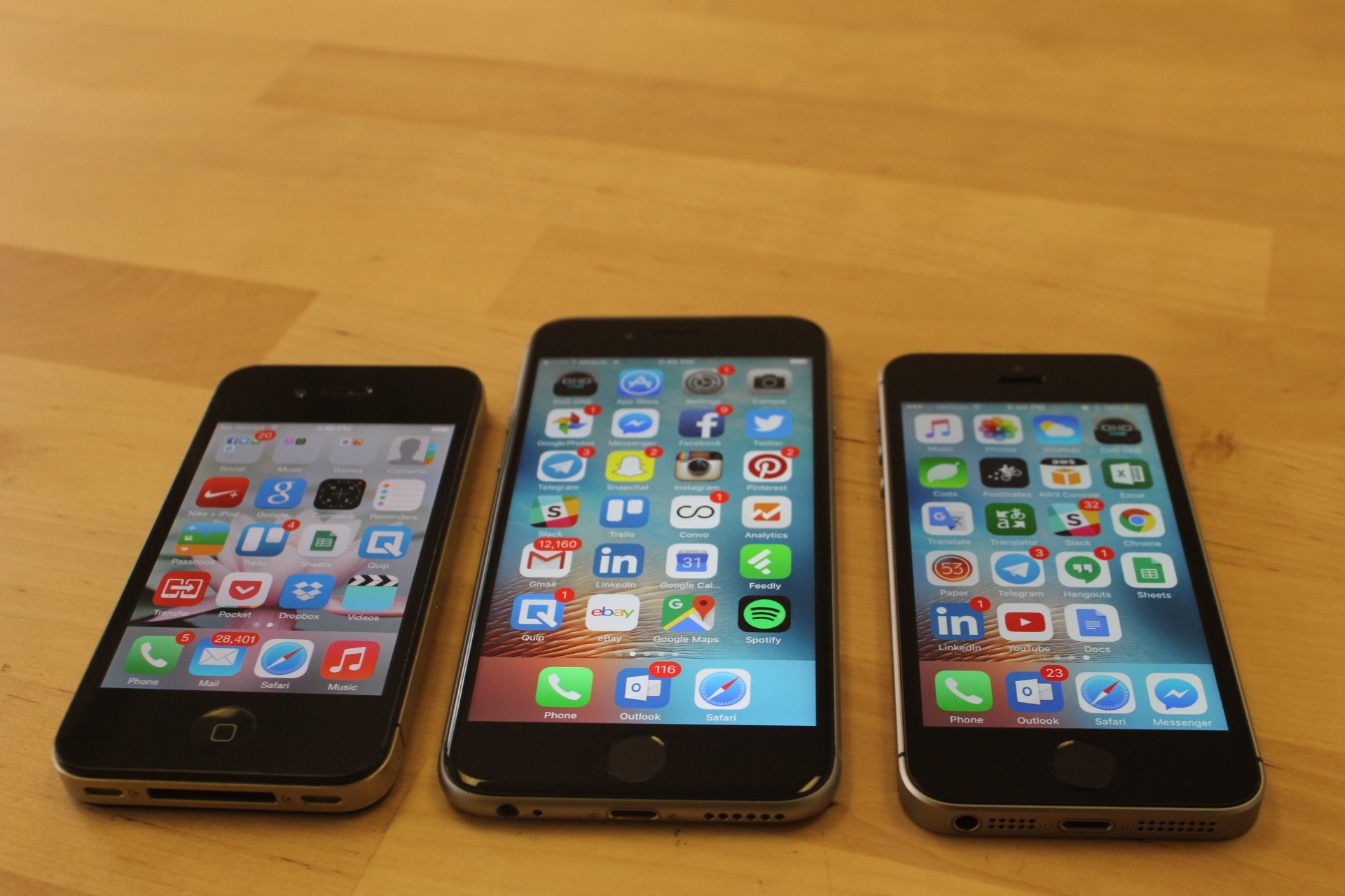 From left, the iPhone 4 from 2010, the iPhone 6s from 2015, and the new iPhone SE.