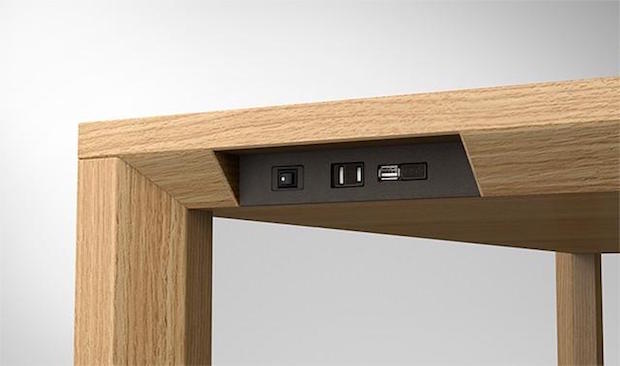 Kamarq power source and USB sockets on table