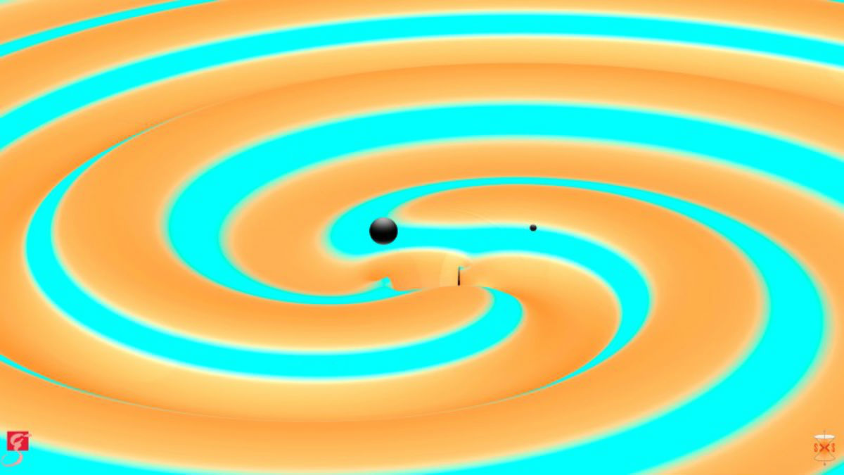 This is an artist rendition shows two black holes 14 and 8 times the mass of the sun (L-R), just moments before they collided and merged to form a new black hole 21 times the mass of the sun in this image released on June 15, 2016.