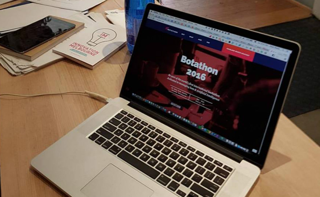 This picture shows a laptop displaying information about VentureBeat's international botathon took place July 9-10, 2016.