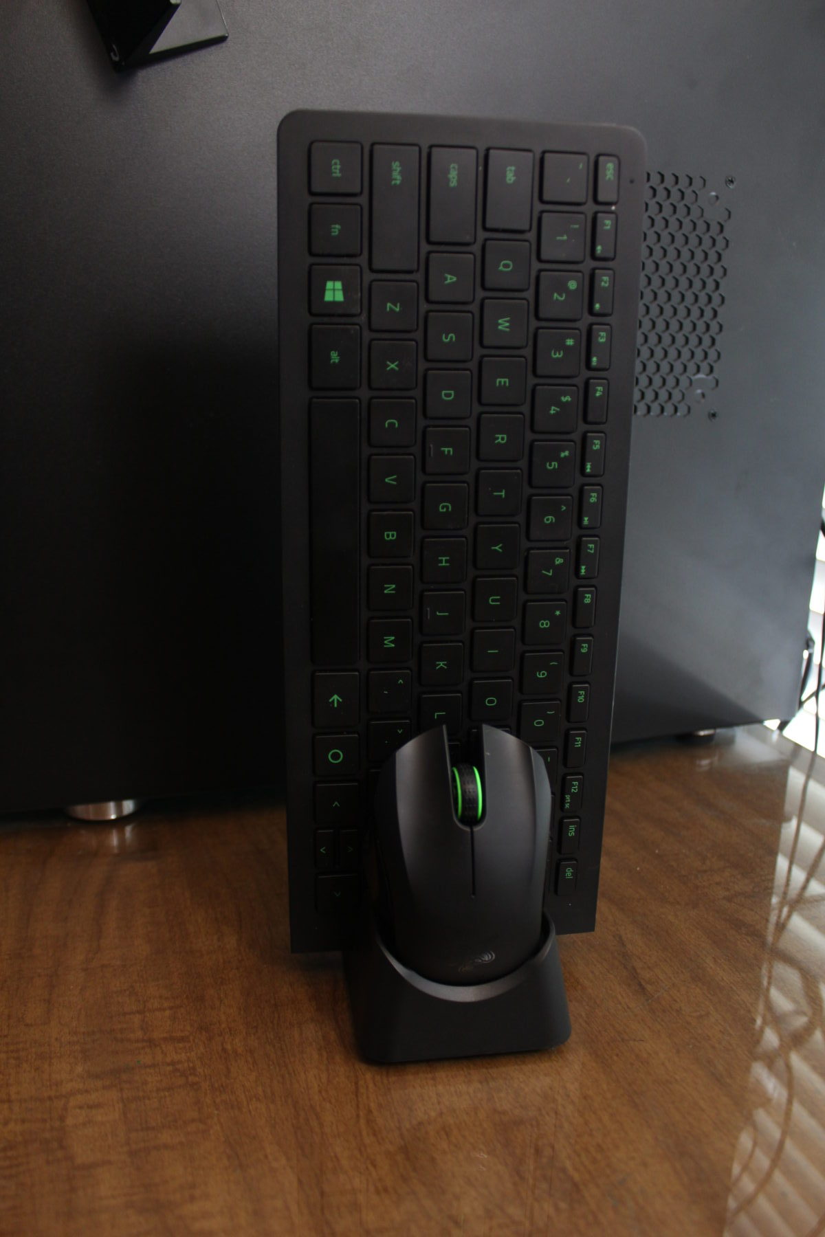 The keyboard and mouse on the charging dock.