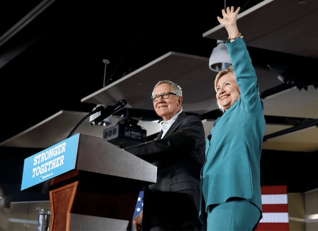 This photo shows Democratic U.S. presidential nominee Hillary Clinton waves after being introduced by Senate Minority Leader Harry Reid (D-NV) during a rally at the International Brotherhood of Electrical Workers (IBEW), Local 357, union hall in Las Vegas, Nevada, U.S. Thursday, August 4, 2016.