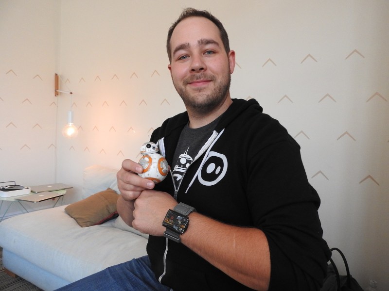 Adam Wilson, cofounder of Sphero, with BB-8 and the Star Wars Force Band.