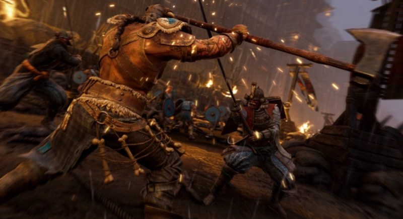 A Viking squares off against a samurai in For Honor.