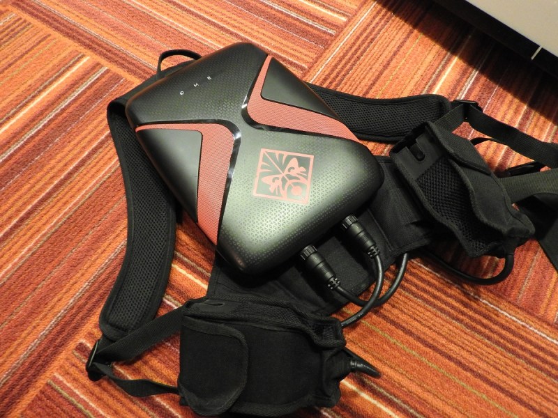 The HP Omen backpack computer has two big cables to connect batteries.