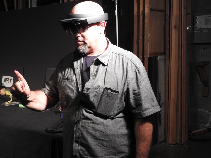 Michael Levine, president of HappyGiant, shows HoloGrid: Monster Battle on Microsoft's HoloLens.