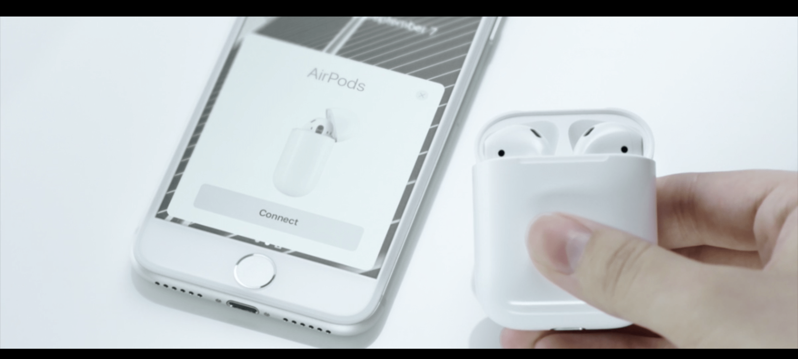 Pairing the AirPods to an iPhone.