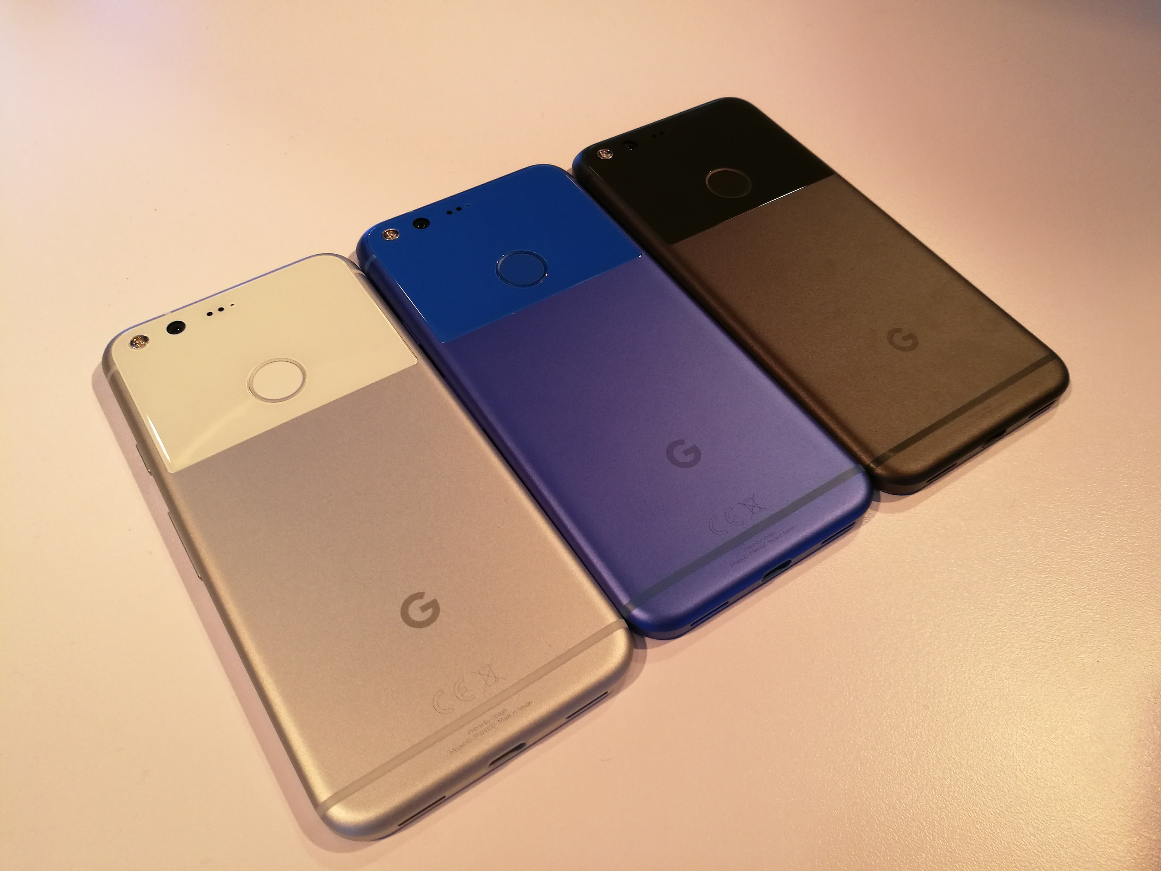 Google Pixel in Very Silver, Quite Black, and Really Blue.